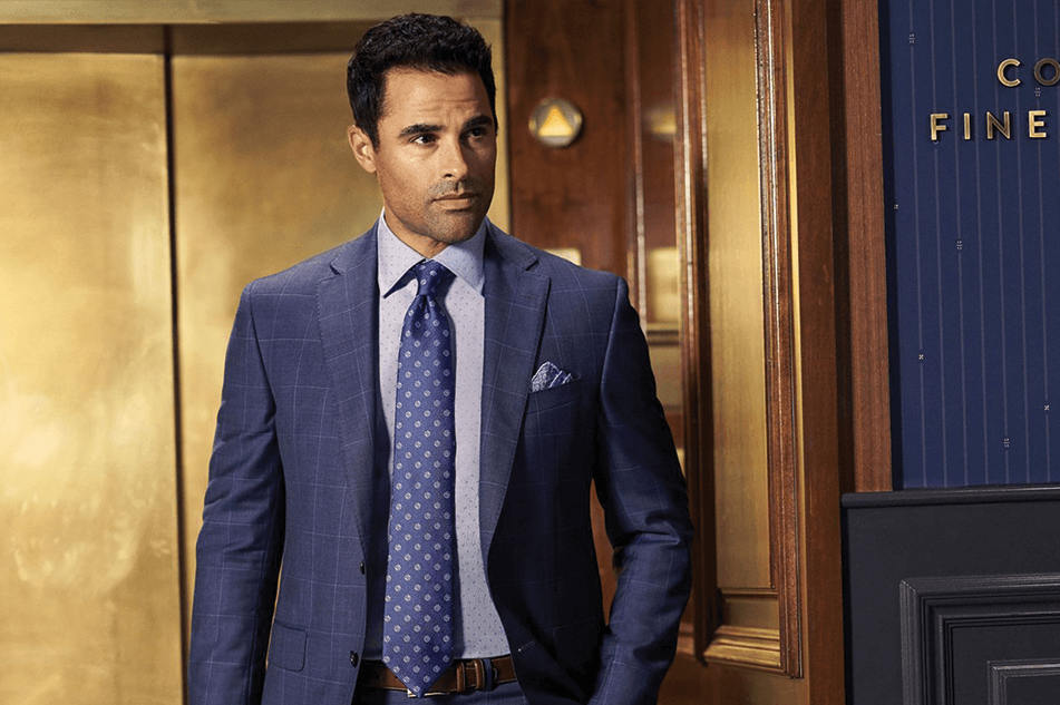 man wearing a blue patterned sport coat or blazer with a matching necktie springfield illinois