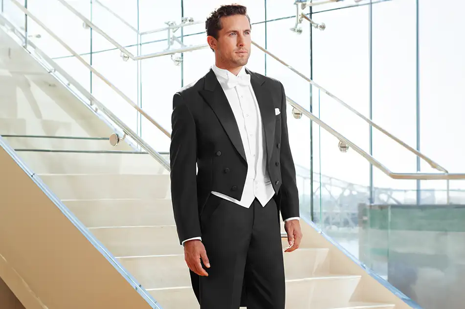 man walking down a staircase wearing a tuxedo springfield illinois